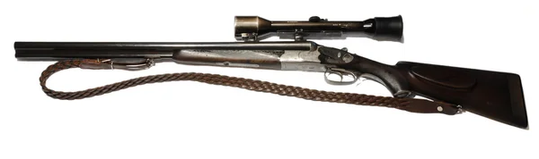 3 barreled rifle with scope and a strap — Zdjęcie stockowe