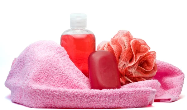 Bathroom accessories covered with towel — Stock Photo, Image