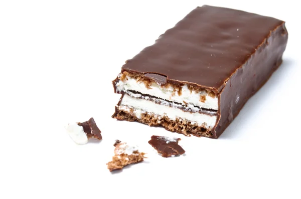 Chocolate bar with skimmings filling cut with crumbs — Stock Photo, Image