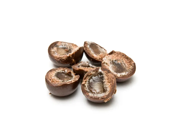 Three chocolate balls cut in half — Stock Photo, Image