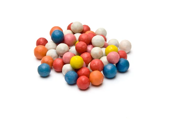 Hög med små färgglada bollen formade sortiment — Stockfoto