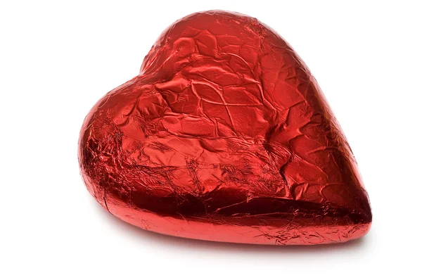 Foil wrapped red chocolate heart — Stock Photo, Image