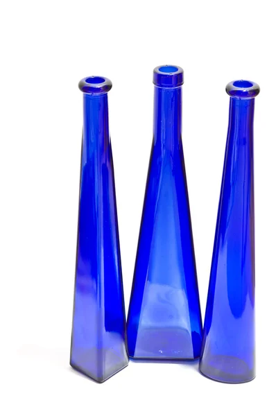 Three blue bottles standing — Stock Photo, Image