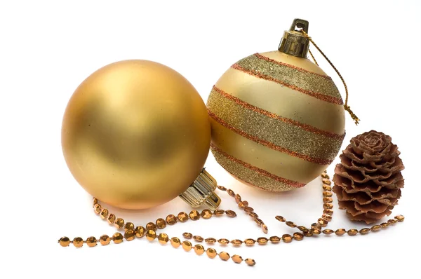Golden glass spheres and christmas decoration — Stock Photo, Image