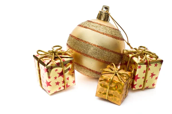 Golden christmas decoration with gift boxes — Stock Photo, Image