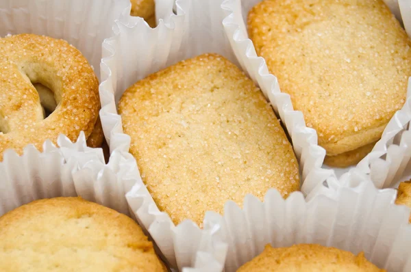 Kekse in Muffinbechern, über Kopf — Stockfoto