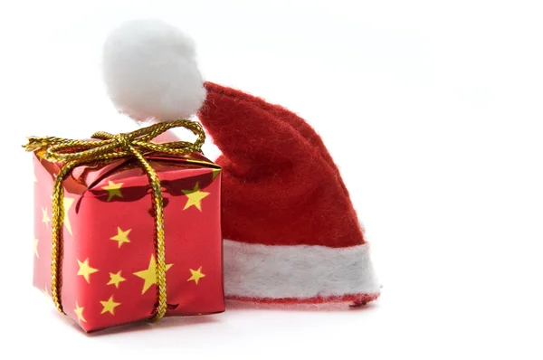 Santa şapka ve hediye kutusu — Stok fotoğraf