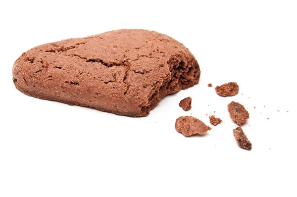Drop shaped chocholate cookie with crumbs — Stock Photo, Image