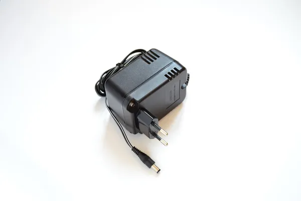 ブラック パワー充電器 ロイヤリティフリーのストック画像