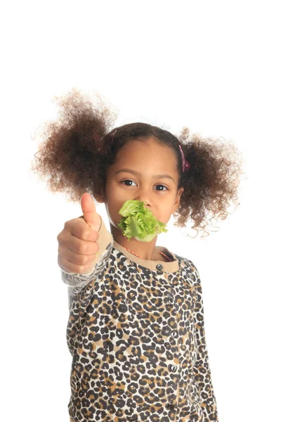 Beautiful child asian African American Black child eats salad i — Stock Photo, Image