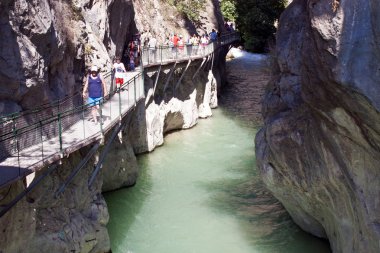 Tourists in Saklikent canyon clipart