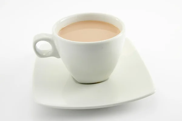 Geïsoleerde kopje koffie en melk — Stockfoto
