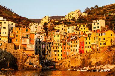 Sunset in the Village of Riomaggiore in Cinque Terre, Italy clipart