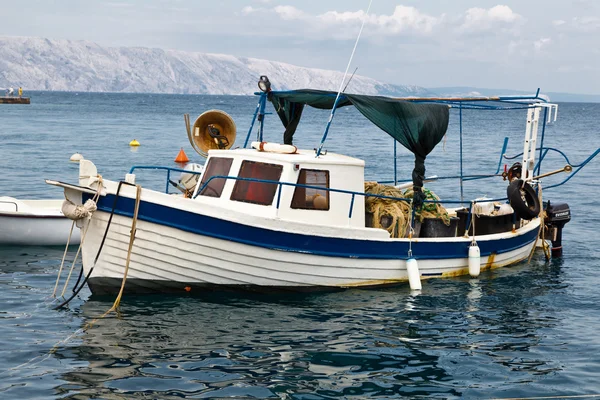 stock image Fisherman Boat Docked at Harbor in Senj, Croatia