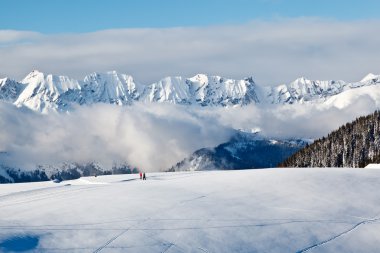 Panoramic View on Mountains and Two Trekking in French Al clipart