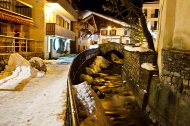 Illuminated Central Square of Megeve in French Alps clipart