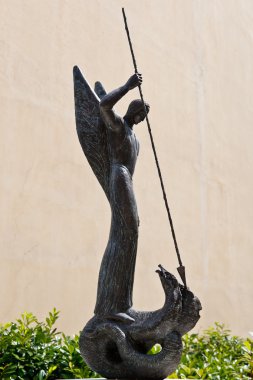 Saint George Killing the Dragon Bronze Monument in Rijeka, Croat clipart