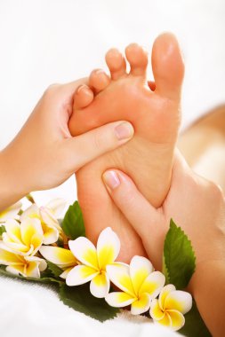 Exotic foot massage clipart