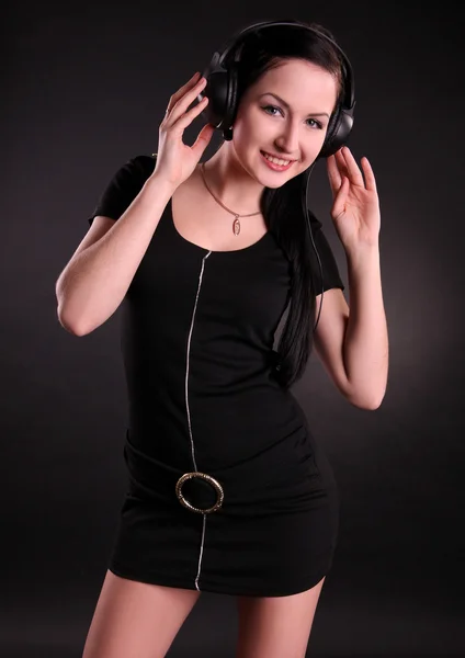 stock image The beautiful girl in headphones