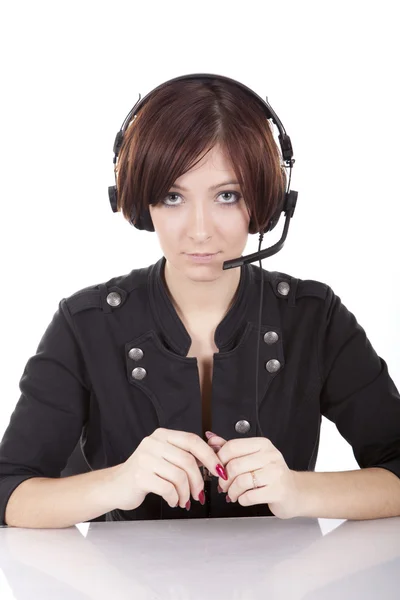Beautiful girl in headphones with a microphone Stock Image