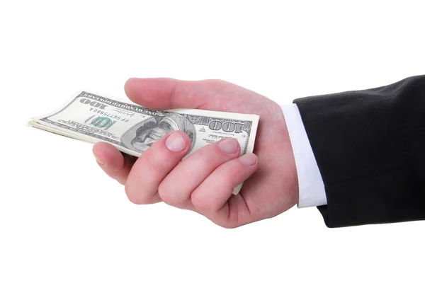 Pengar i dollar i mannens hand fläkt — Stockfoto