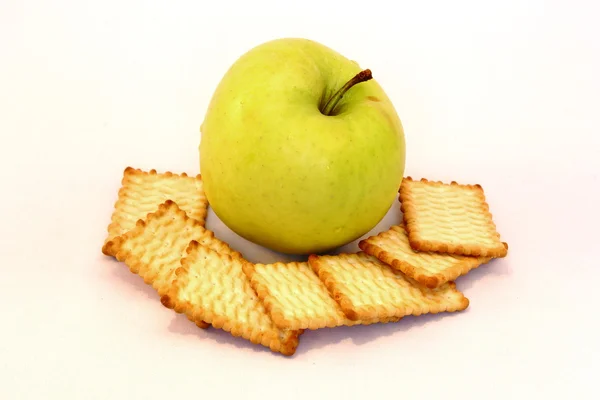 Apple and biscuits — Stock Photo, Image