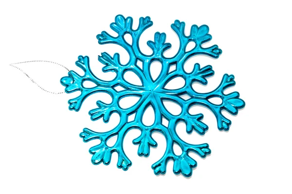 Blue snowflake on a white background — Stock Photo, Image