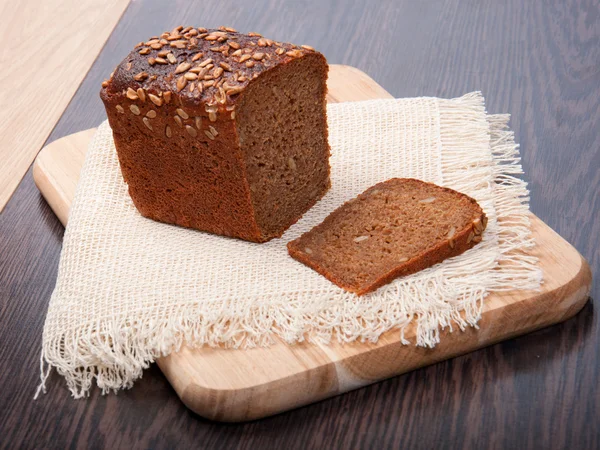 stock image Brown bread on a linen cloth