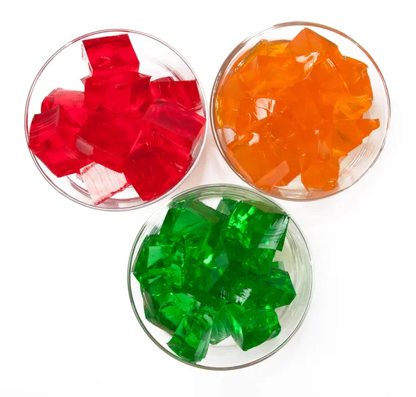 Čerstvé barevné želé v skleněný talíř s ovocem — Stock fotografie