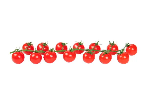 Třešňová rajčata izolovaná na bílém — Stock fotografie