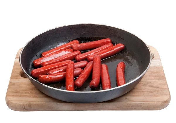 Roasted sausages on the pan — Stock Photo, Image