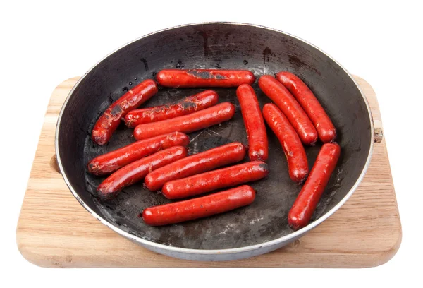 Roasted sausages on the pan — Stock Photo, Image
