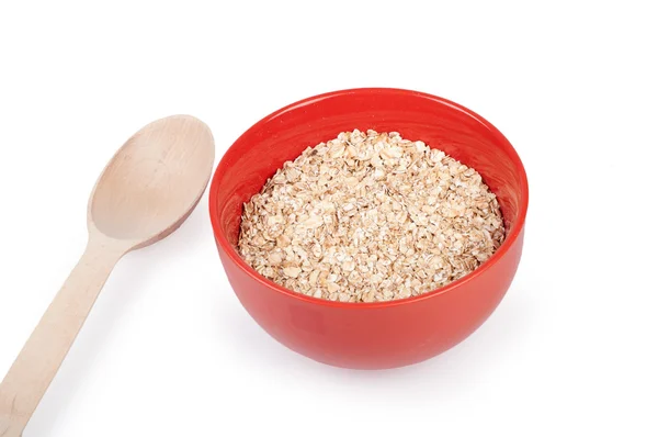 stock image oat flakes in plate isolated on a white