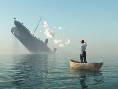 Gemide kurtarılan adam gemi enkazına bakıyor.