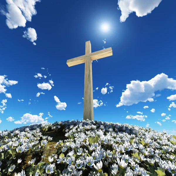 Крест в окружении цветов — стоковое фото