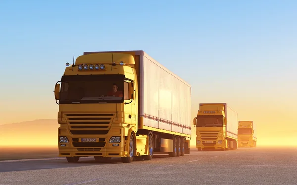 Vrachtwagen op weg bij zonsopgang — Stockfoto