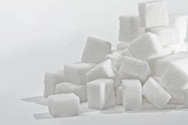 Stack of white sugar cubes. — Stock Photo, Image