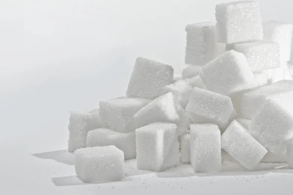 stock image Stack of white sugar cubes.