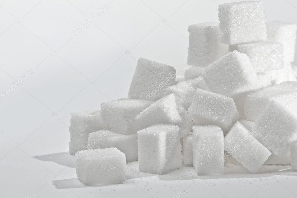 Stack of white sugar cubes.