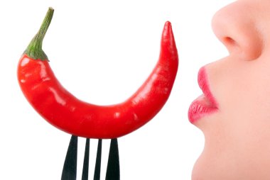 A red pepper is kissed clipart