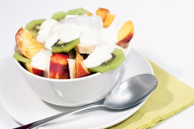 Bowl of fresh fruit and yogurt V1 clipart