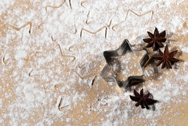 Star-shaped and star anise in the flour V1 clipart