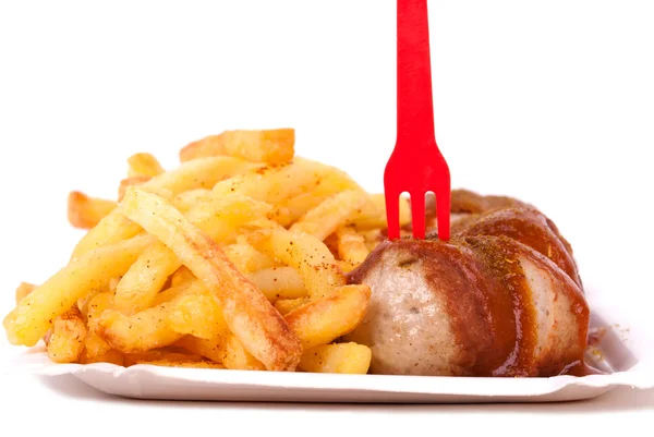 Currywurst und Pommes — Stockfoto