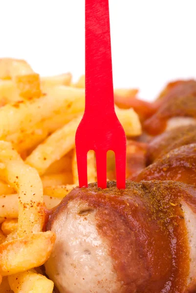 Curried sausage and chips — Stock Photo, Image