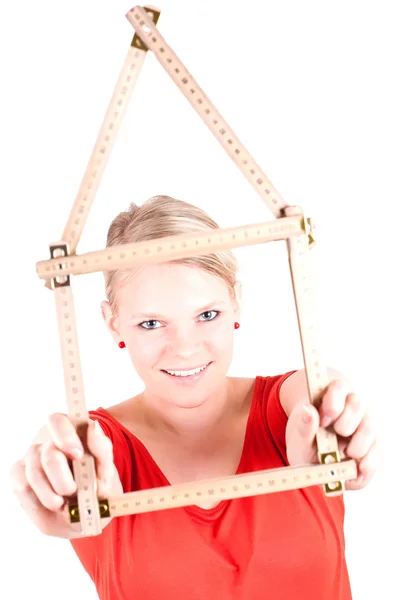 Young woman with house symbol — Stock Photo, Image
