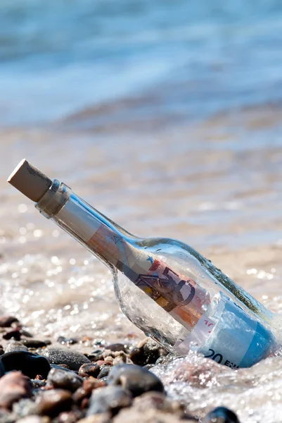Message in a bottle euronotes — Stock Photo, Image