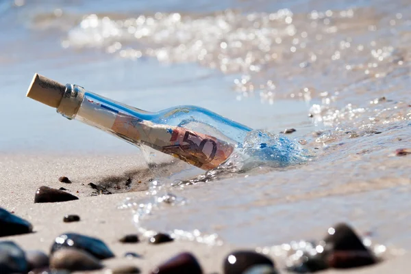 Message in a bottle euronotes — Stock Photo, Image