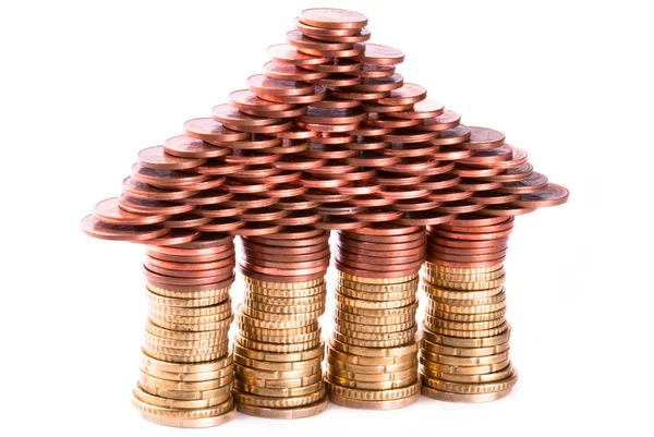 A house build of coins Stock Image