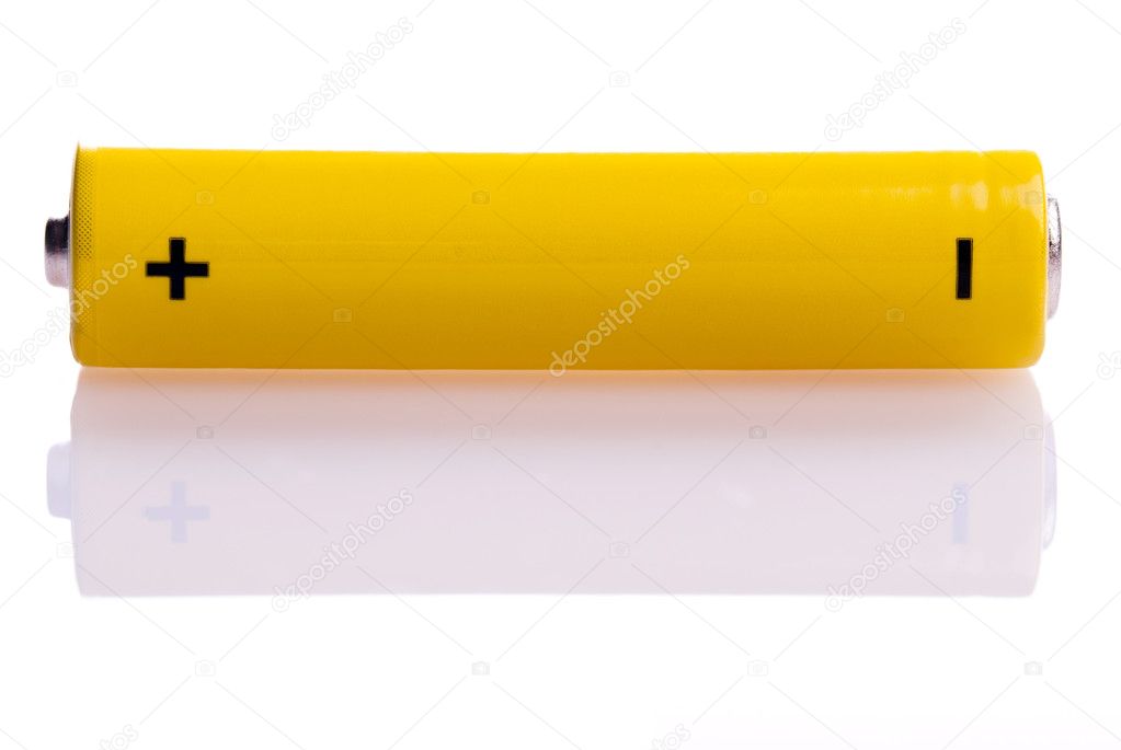 Yellow battery lying across