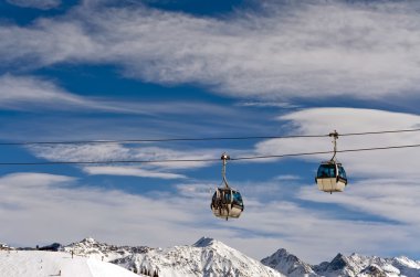 Ski lift over the skiing region clipart
